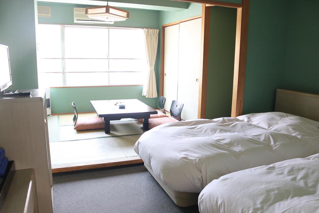 Hotel Sankeien Szapporo Szoba fotó